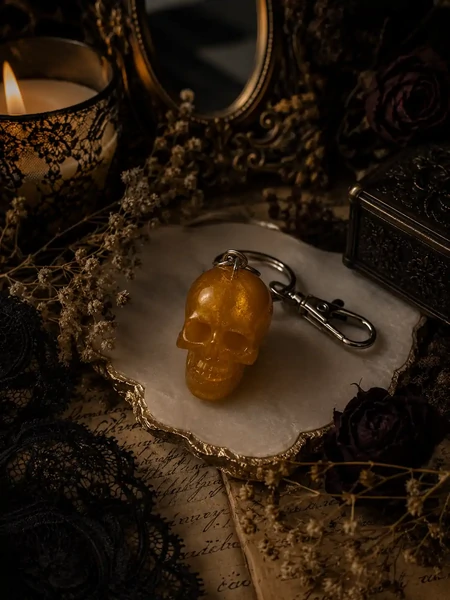 Golden skull charm